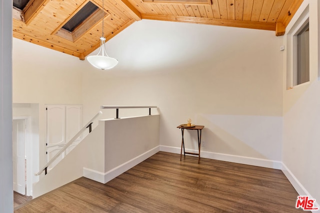 interior space featuring wood ceiling, lofted ceiling with skylight, and hardwood / wood-style flooring