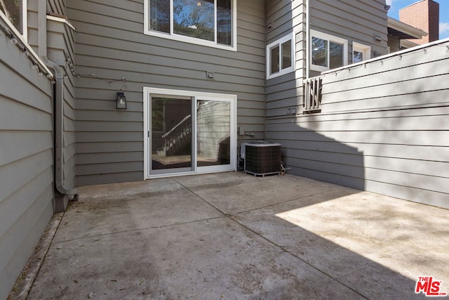 view of patio / terrace featuring cooling unit