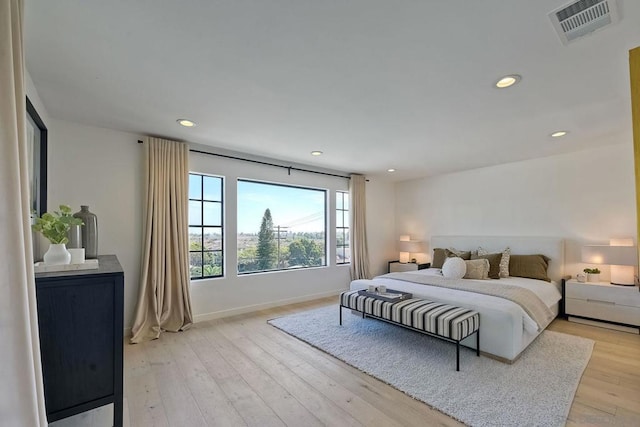 bedroom featuring light wood-type flooring