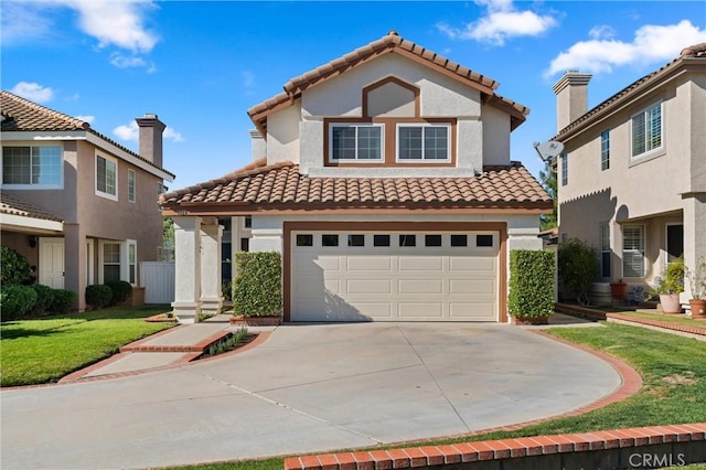 mediterranean / spanish-style home featuring a garage and a front lawn