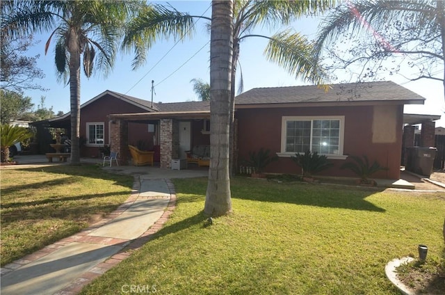 ranch-style house with a front lawn