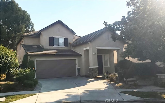 view of front of house with a garage