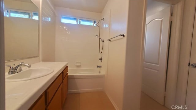 bathroom featuring vanity, bathing tub / shower combination, and tile patterned floors