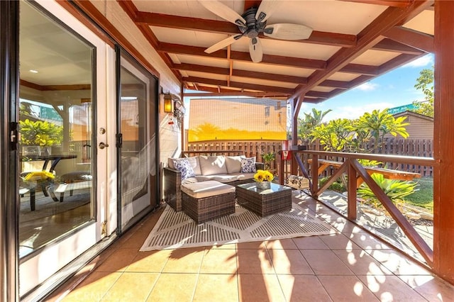 balcony with ceiling fan, a patio area, and an outdoor hangout area