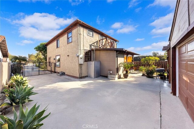 back of property with a patio area