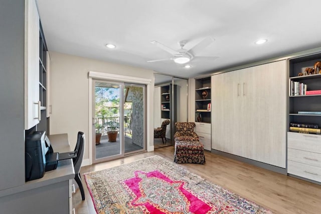 office area featuring ceiling fan and light hardwood / wood-style flooring