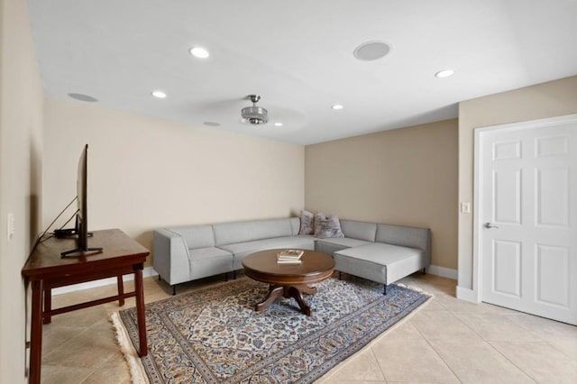 tiled living room featuring ceiling fan