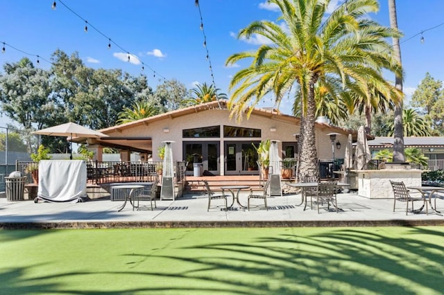 rear view of property with a patio area