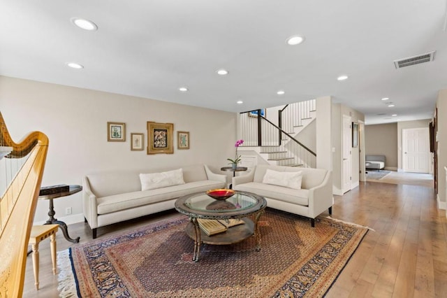 living room with light hardwood / wood-style floors