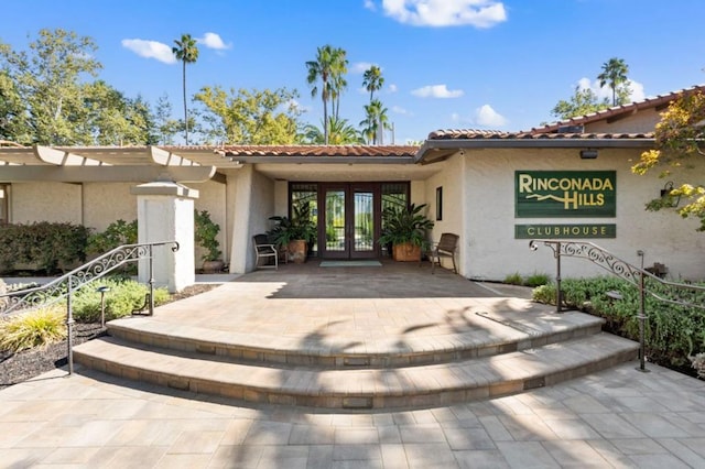 view of exterior entry with french doors