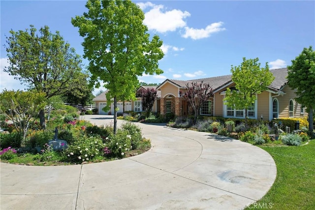 19490 Calle Juanito, Murrieta, CA 92562 - view of front of house featuring curved driveway and a tiled roof