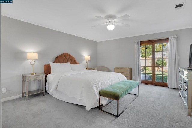 carpeted bedroom with ceiling fan and access to outside