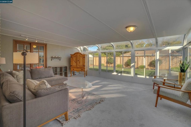 sunroom / solarium featuring a healthy amount of sunlight