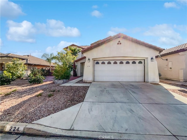 view of front of home featuring a garage