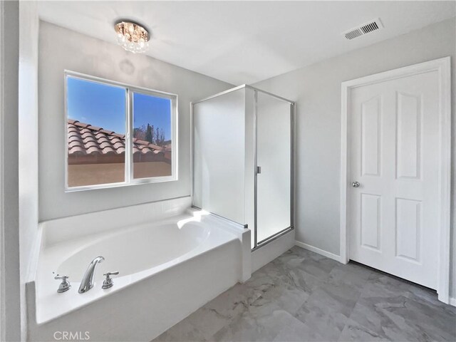 bathroom with a tub