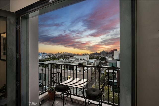 view of balcony at dusk