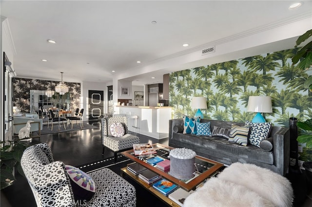 living room featuring wood-type flooring and ornamental molding