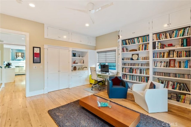 sitting room featuring light wood-type flooring and recessed lighting