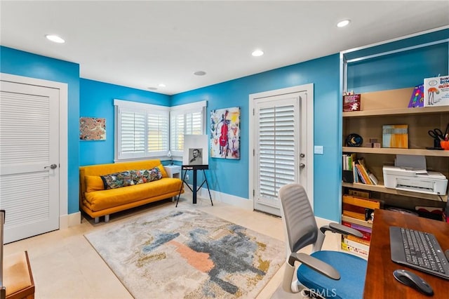 office space featuring baseboards and recessed lighting