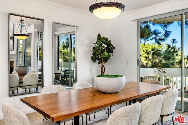 dining room with ornamental molding