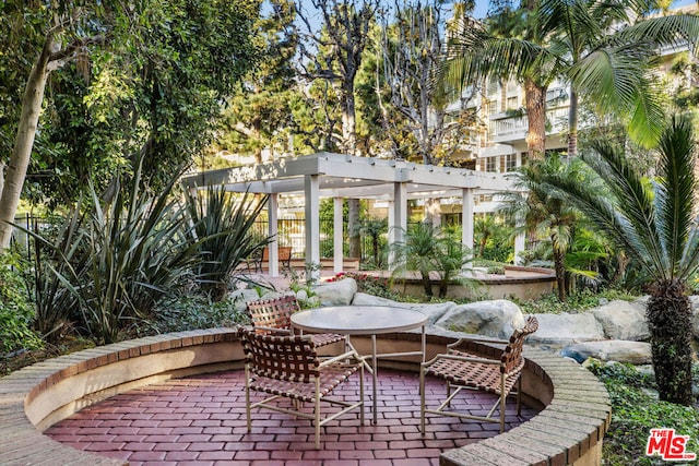 view of patio / terrace featuring a pergola