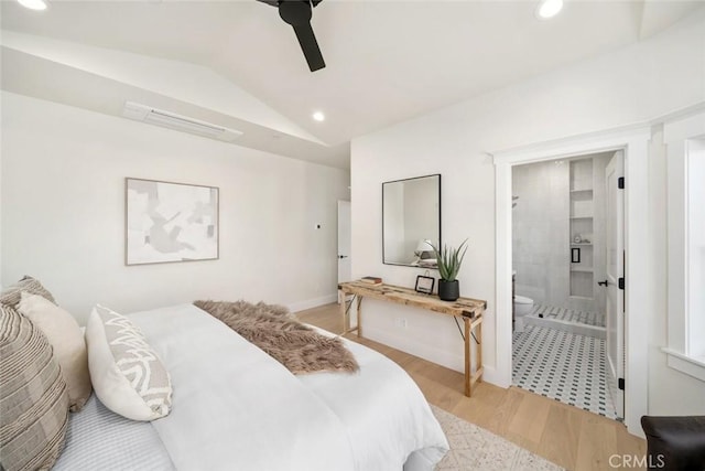 bedroom with connected bathroom, ceiling fan, light wood-style flooring, vaulted ceiling, and recessed lighting