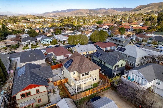 drone / aerial view featuring a mountain view