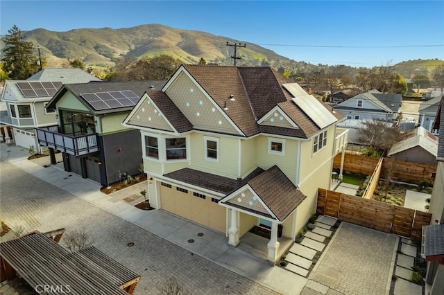 drone / aerial view featuring a mountain view