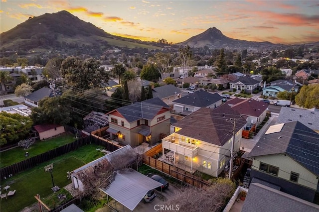 aerial view at dusk with a mountain view