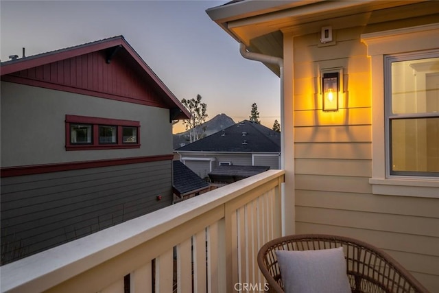 view of balcony at dusk