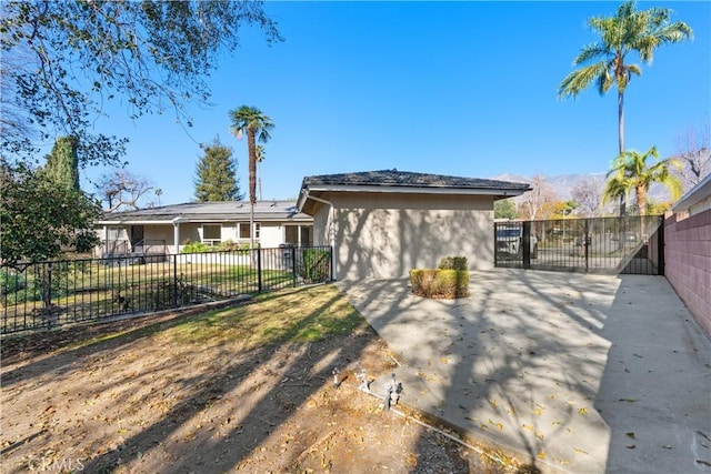 back of house with a patio