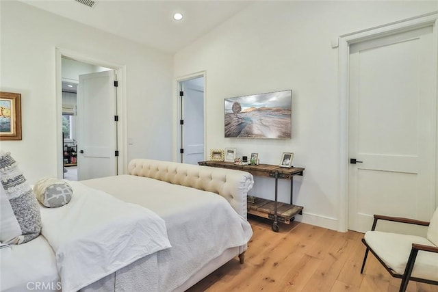 bedroom featuring light wood-type flooring