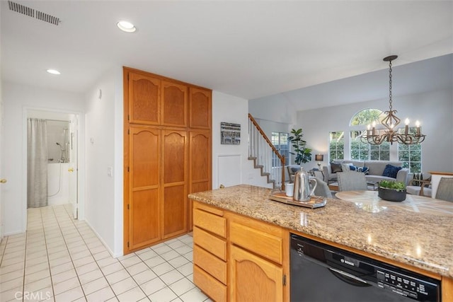 kitchen with black dishwasher, a chandelier, hanging light fixtures, light tile patterned floors, and light stone countertops