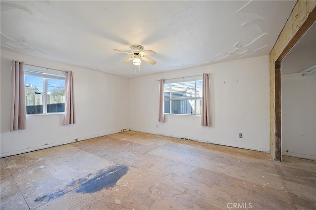 spare room with ceiling fan