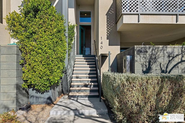 entrance to property with a balcony