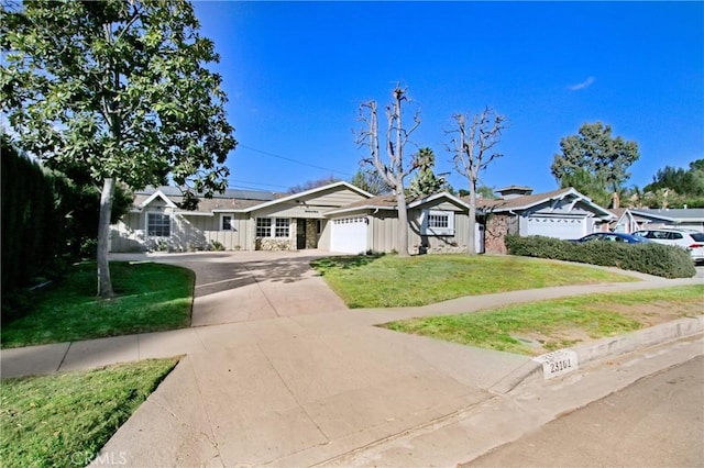 ranch-style house with a front lawn and a garage