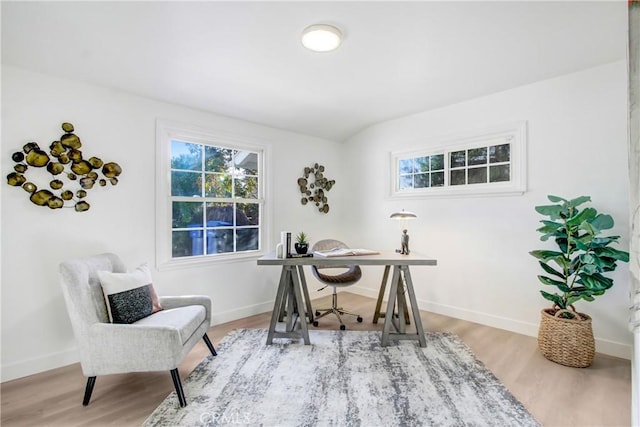 home office featuring light wood-type flooring