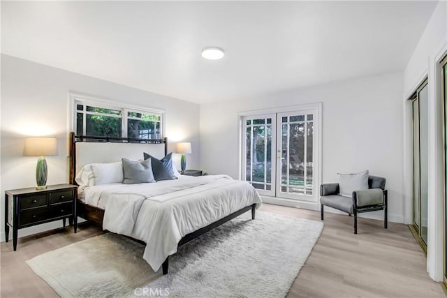 bedroom with light hardwood / wood-style floors