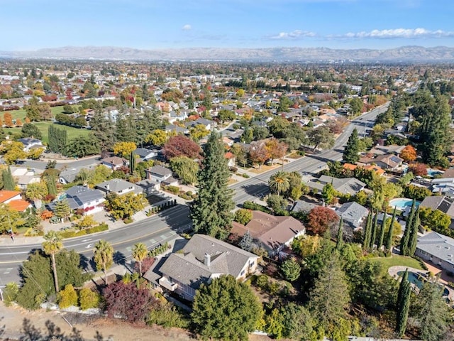 drone / aerial view featuring a mountain view