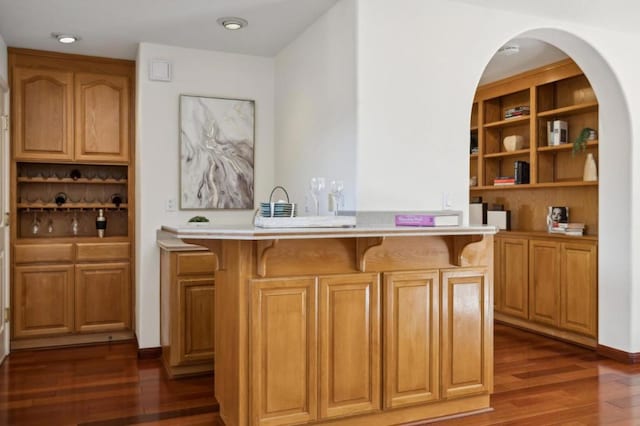 bar featuring dark hardwood / wood-style floors