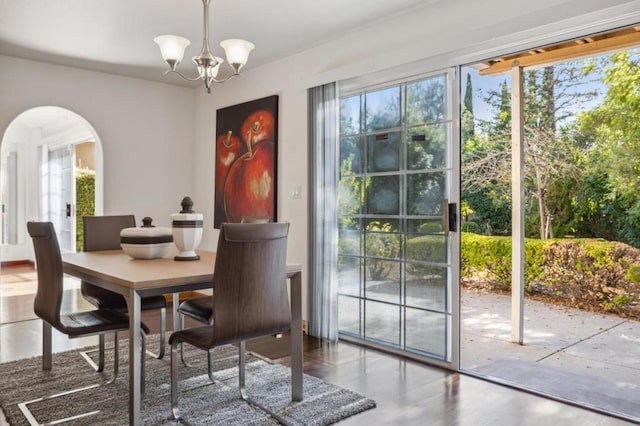 dining area featuring a chandelier