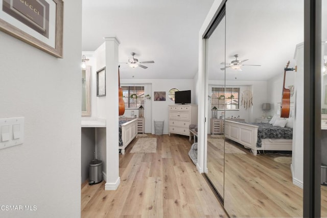 bathroom featuring ceiling fan and hardwood / wood-style floors