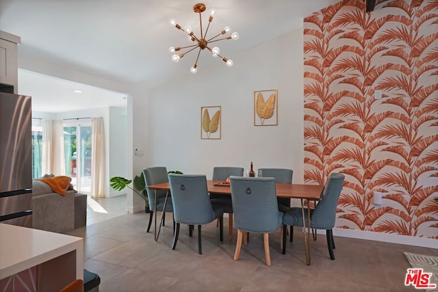 dining area featuring an inviting chandelier