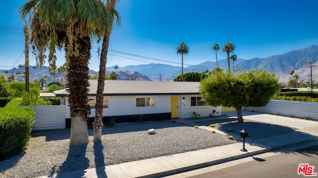 ranch-style house featuring a mountain view