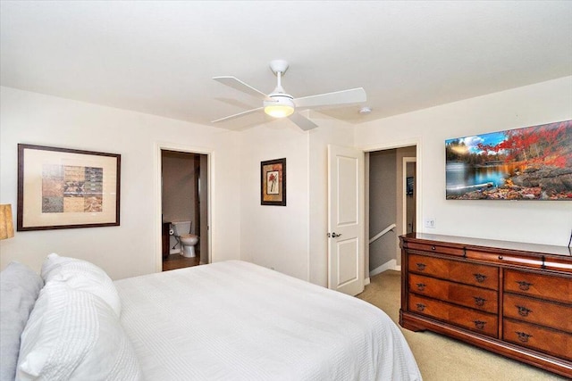 bedroom with ceiling fan and light carpet