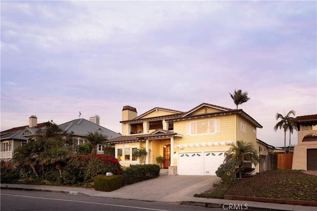 view of front of home with a garage