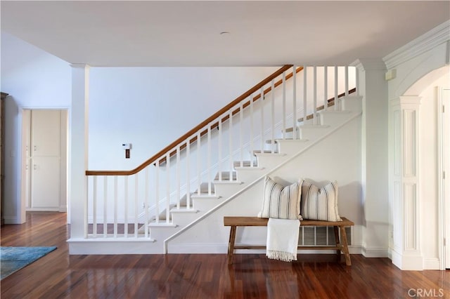 stairway featuring hardwood / wood-style flooring