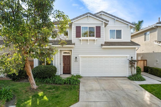 view of front of property with a garage