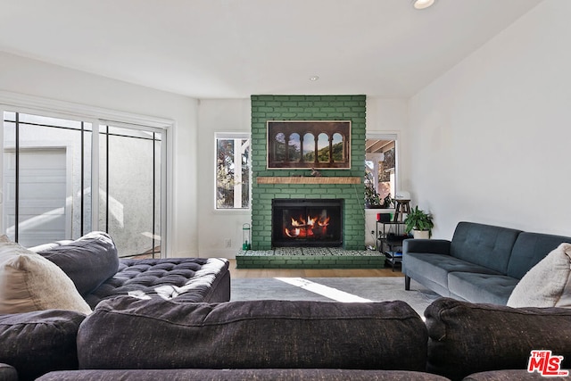 living room featuring a fireplace