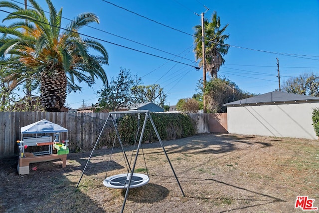 view of yard with a playground